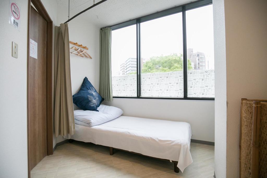 123 Guesthouse Osaka Quarto foto